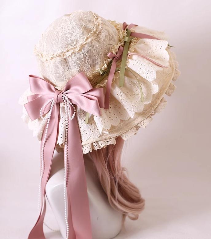 Xiaogui - Elegant Lolita Sunshade Hat Floral Bow Hats One Size. The brim has soft wires that can be shaped. Cotton ribbon in Korean pink + light green (lace hat)