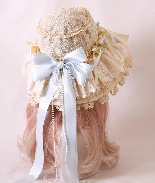 Xiaogui - Elegant Lolita Sunshade Hat Floral Bow Hats One Size. The brim has soft wires that can be shaped. Satin ribbon in light blue and beige (lace hat)
