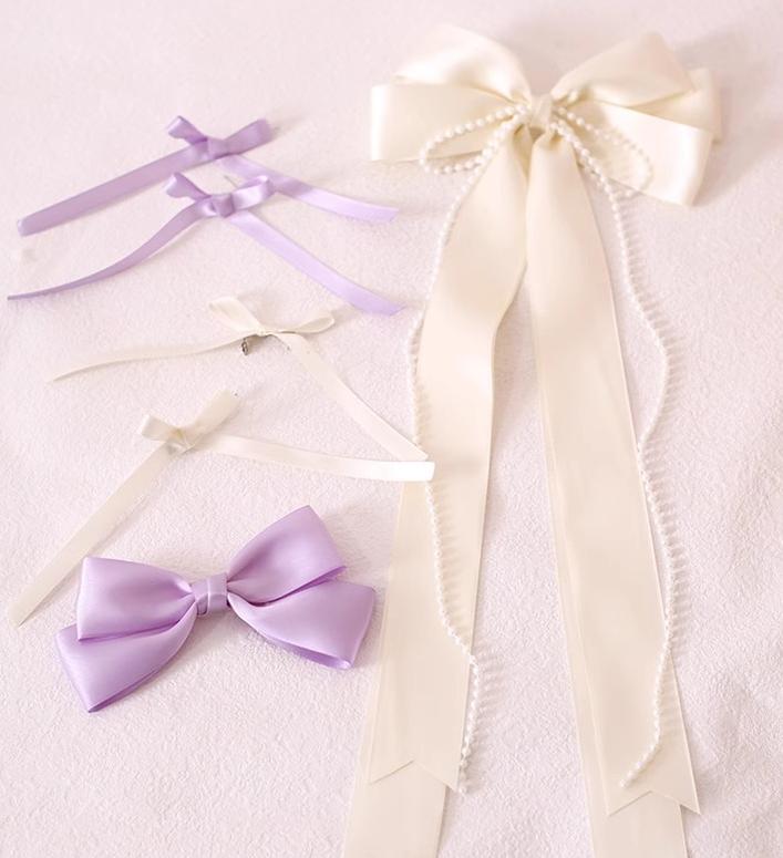Xiaogui - Elegant Lolita Sunshade Hat Floral Bow Hats One Size. The brim has soft wires that can be shaped. Satin ribbon in milk white and light purple with a set of brooches