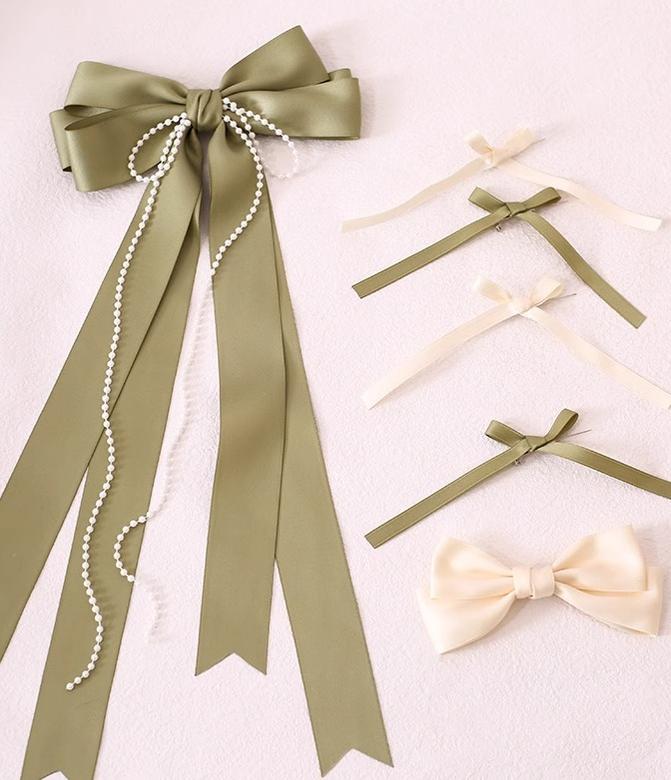 Xiaogui - Elegant Lolita Sunshade Hat Floral Bow Hats One Size. The brim has soft wires that can be shaped. Cotton ribbon in light green and beige with a set of brooches