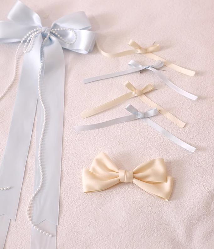 Xiaogui - Elegant Lolita Sunshade Hat Floral Bow Hats One Size. The brim has soft wires that can be shaped. Satin ribbon in light blue and beige with a set of brooches