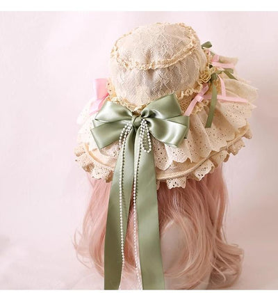 Xiaogui~Elegant Lolita Sunshade Hat Floral Bow Hats One size fits all. The brim has soft wires that can be shaped. Satin ribbon in light green and light pink (lace hat) 